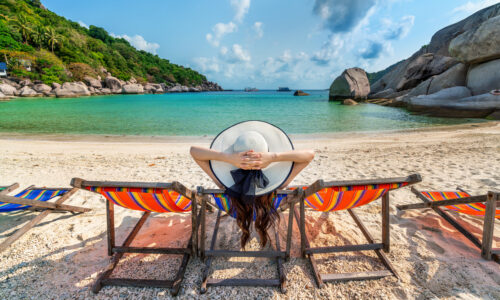 woman with hat sitting chairs beach beautiful tropical beach woman relaxing tropical beach koh nangyuan island